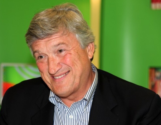 image of Dr. James R Doty with a green background