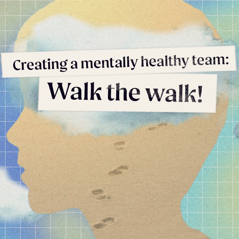 A person's profile is layered over a multi-colored background with clouds in the distance. The profile holds the image of foot prints walking in the sand. Near the top of their head we read: "Creating a mentally healthy team: Walk the walk!"